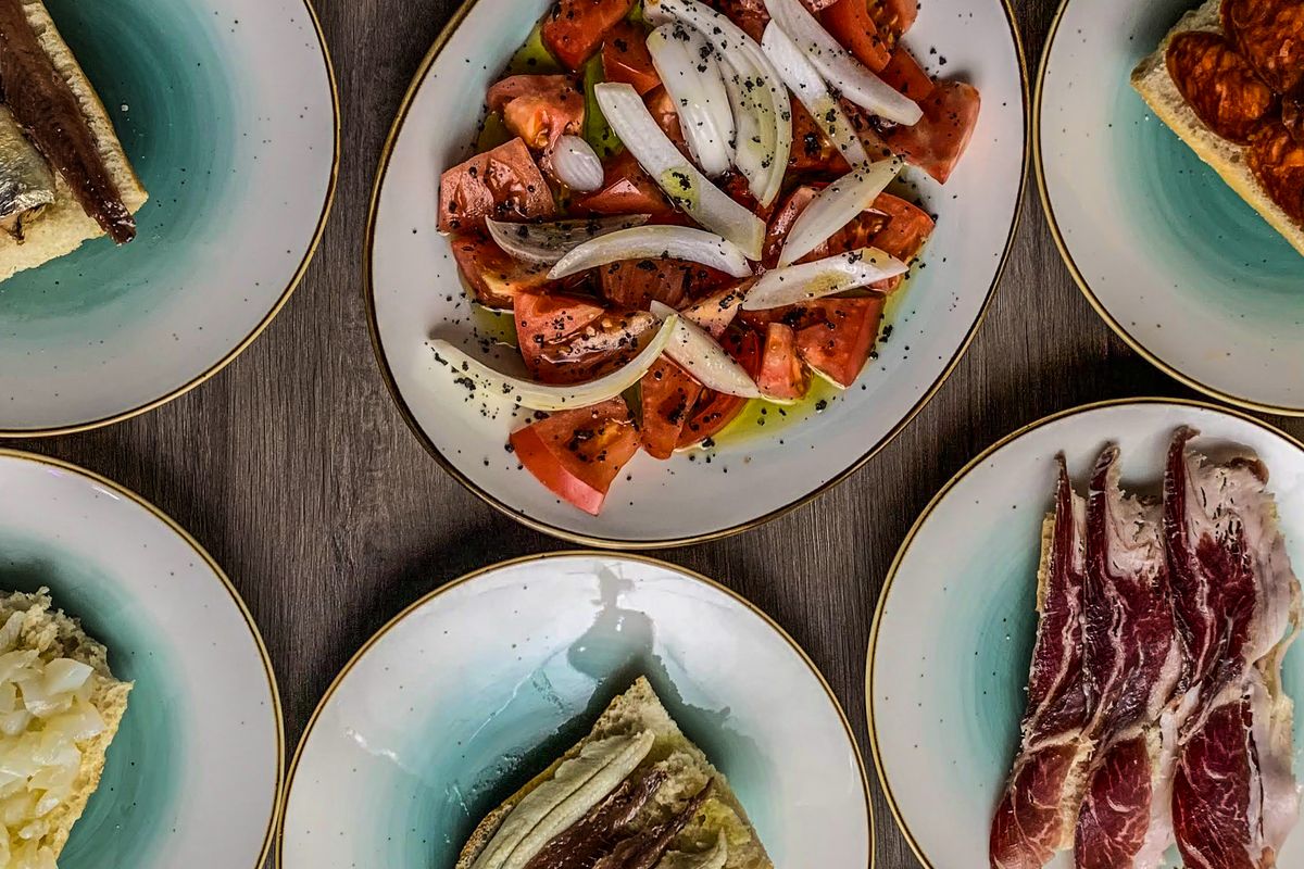 Traditional Andalusian cuisine plated at a restaurant