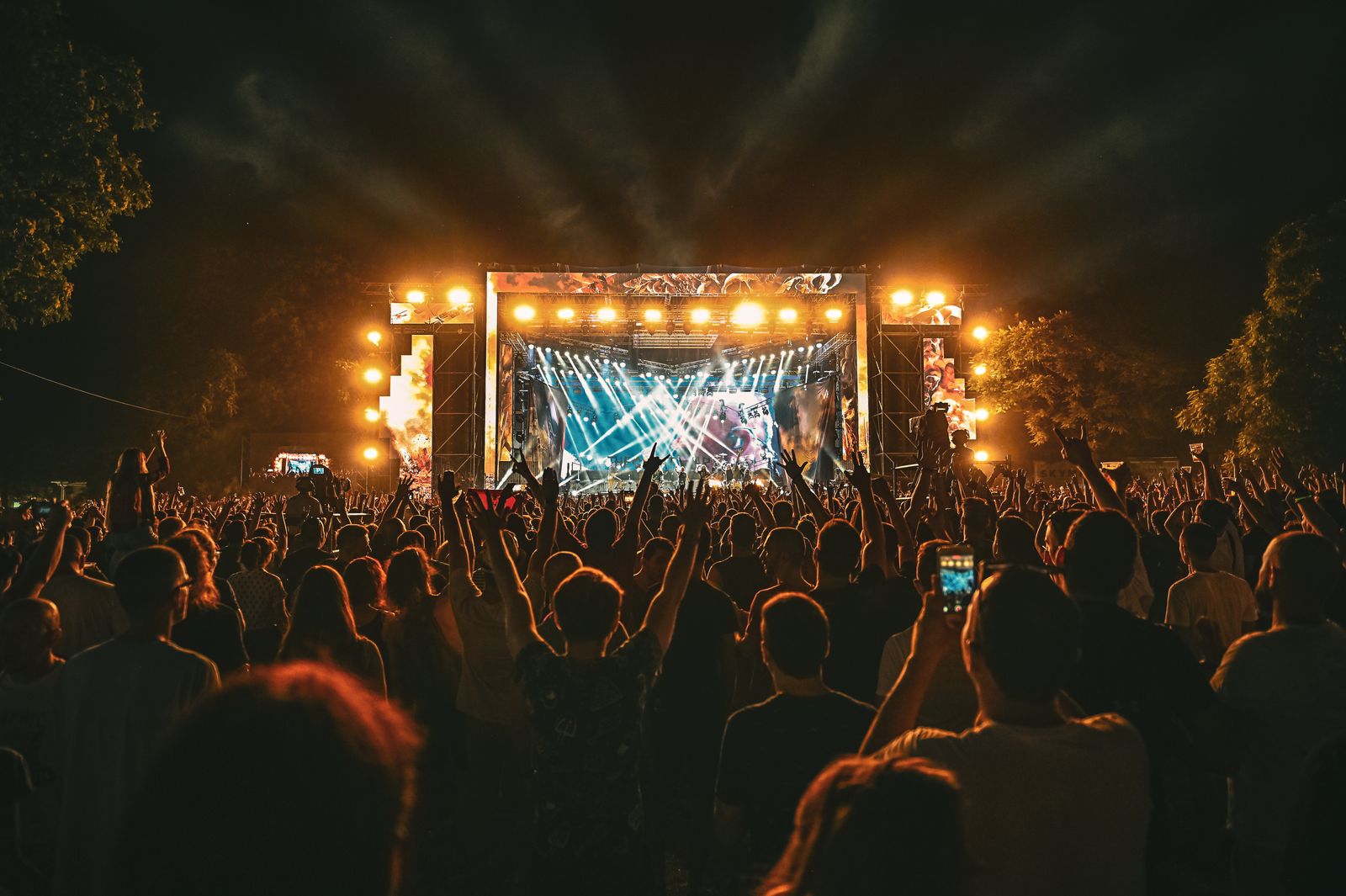 A festival crowd at an open-air night concert